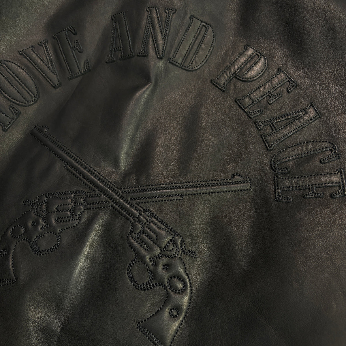 COW LEATHER ZIP PUFFER JACKET / BLACK